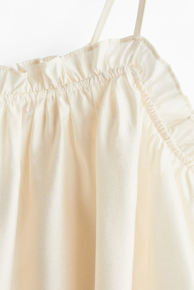 Camisole volantée à bretelles fines