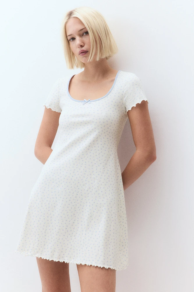 Overlocked-Trim Dress with Flared Skirt