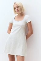 Overlocked-Trim Dress with Flared Skirt