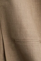 Veste de costume à fentes latérales