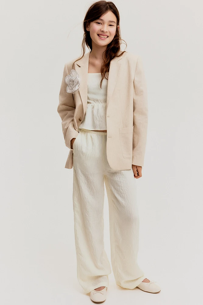 Pantalon avec détails à nouer
