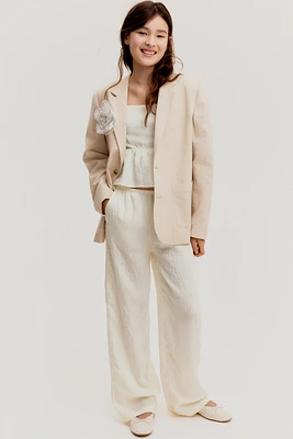 Pantalon avec détails à nouer