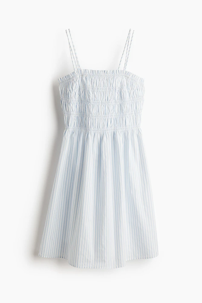 Robe en coton à corsage nid d'abeille