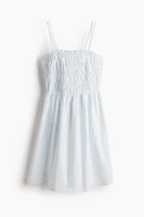 Robe en coton à corsage nid d'abeille