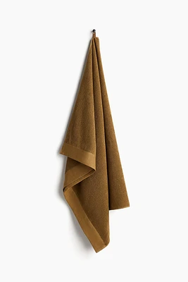 Serviette de bain en coton éponge