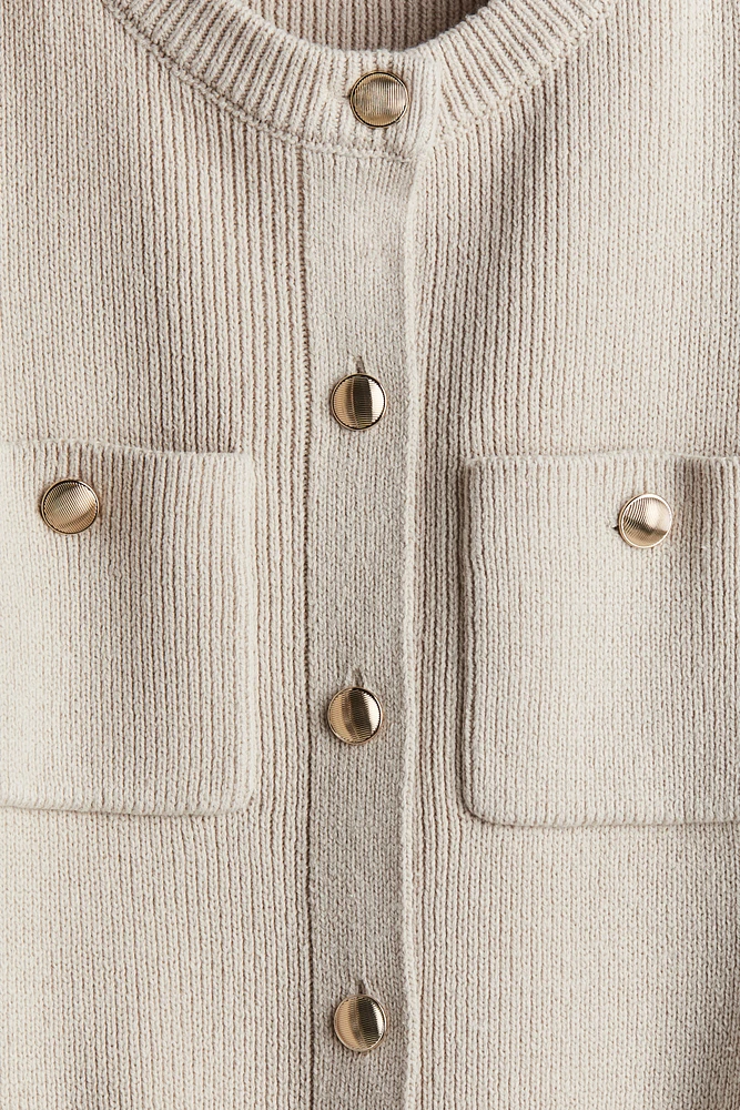Robe en tricot avec poches devant