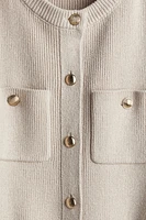 Robe en tricot avec poches devant