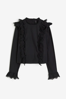 Ruffled Blouse with Eyelet Embroidery Details