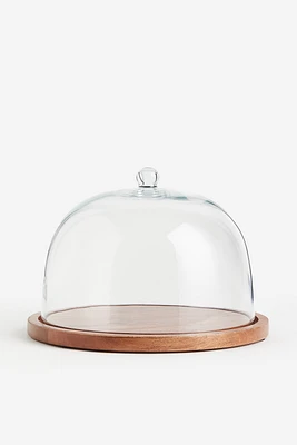 Cloche en verre avec plateau en bois