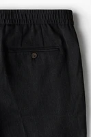 Pantalon classique avec plis