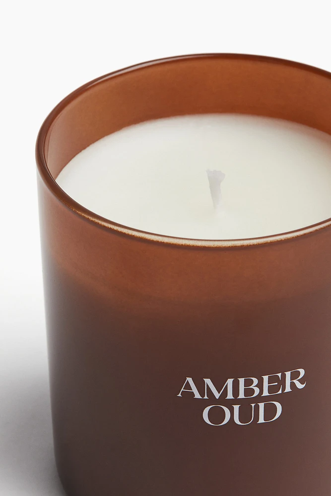 Bougie parfumée dans un pot en verre