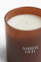 Bougie parfumée dans un pot en verre