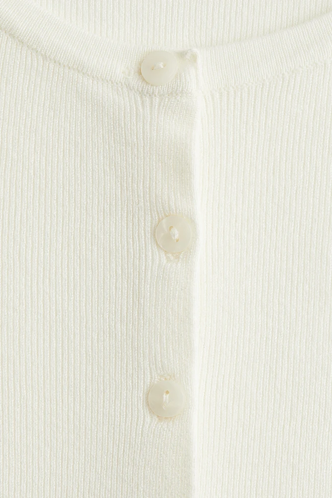 Gilet à manches courtes en fin tricot