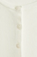 Gilet à manches courtes en fin tricot