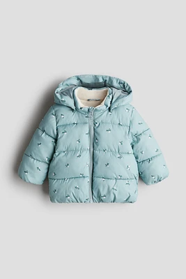 Manteau en duvet déperlant