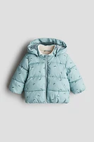 Manteau en duvet déperlant