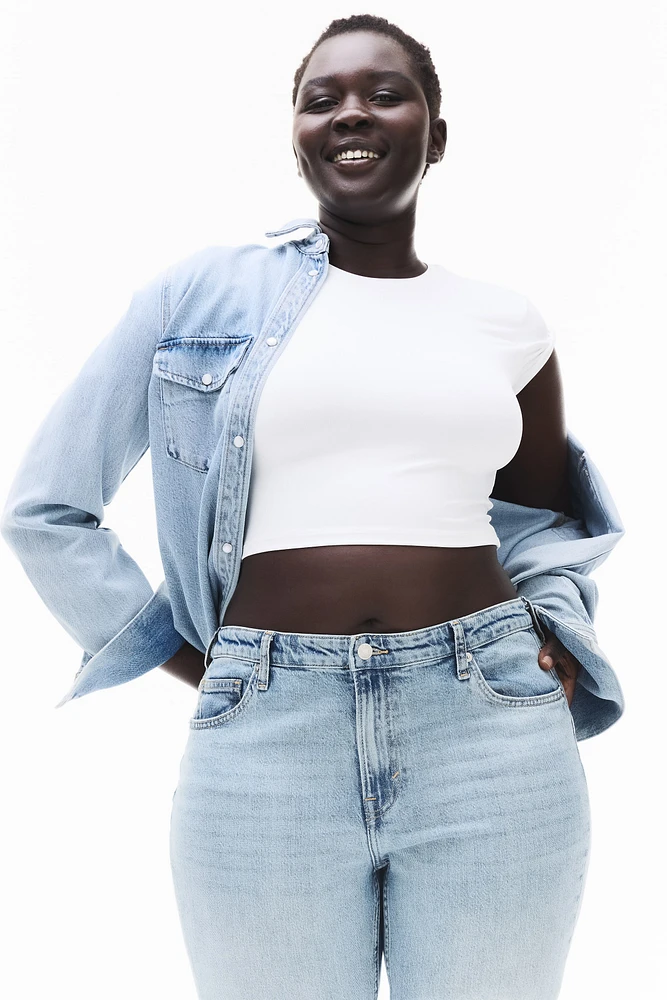 Jean évasé coupe galbée taille haute