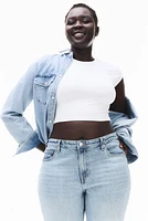 Jean évasé coupe galbée taille haute