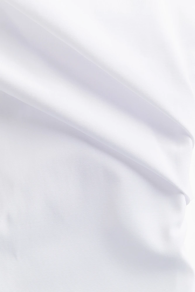 Haut asymétrique drapé