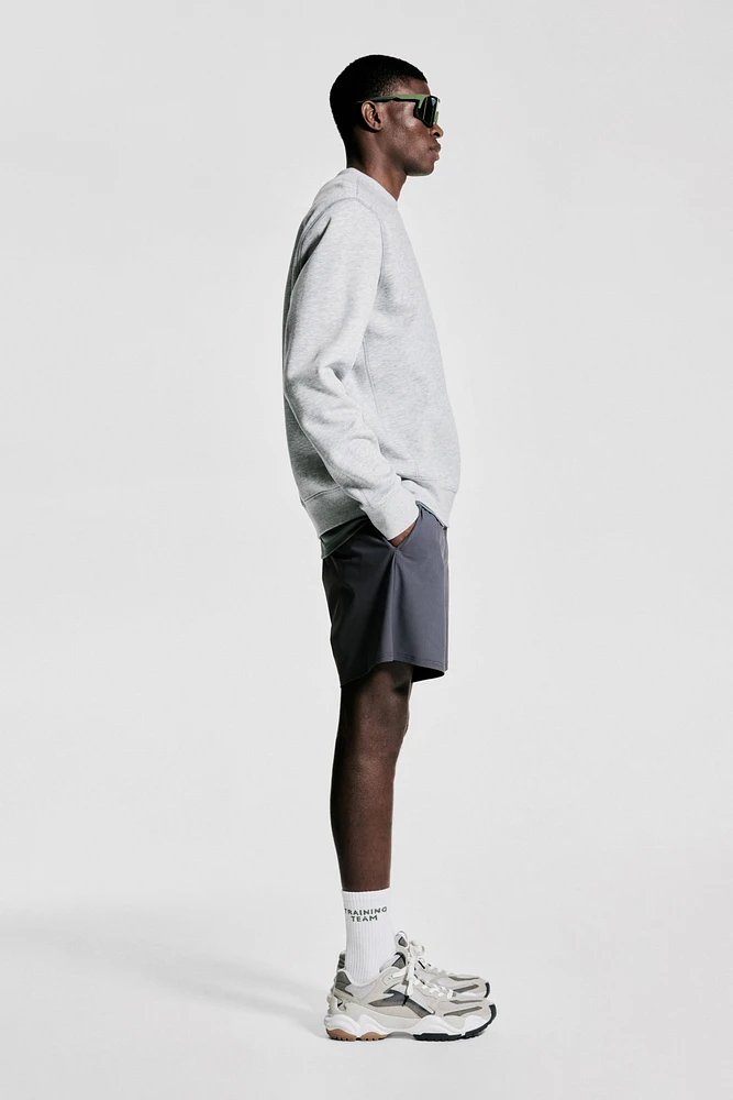 Short de sport mi-long 2-en-1 DryMove™