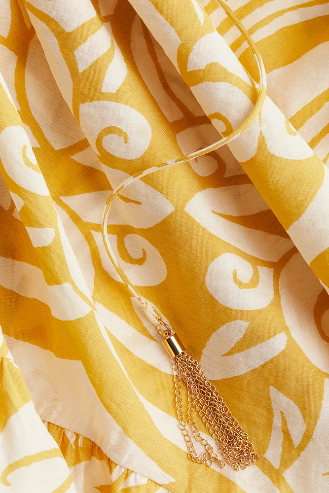 Robe avec cordon de serrage