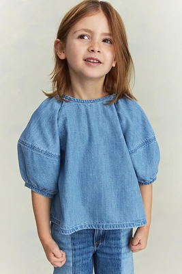 Flared denim blouse