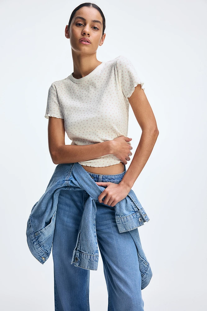 T-shirt avec détails surjetés