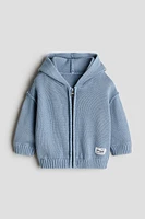 Veste tricot de coton, capuche, fermeture éclair