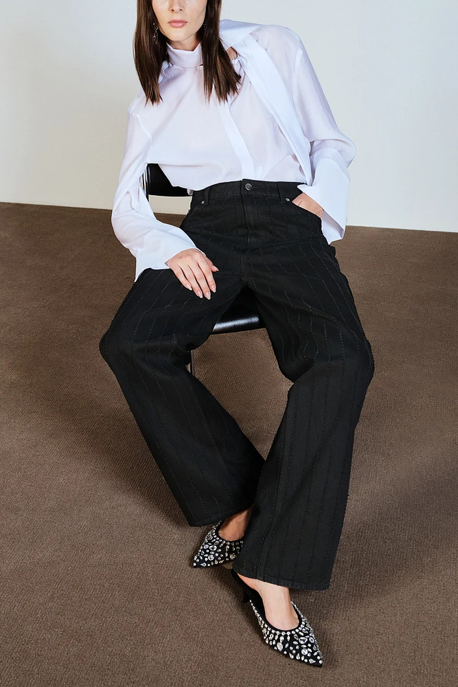 Jean avec plis