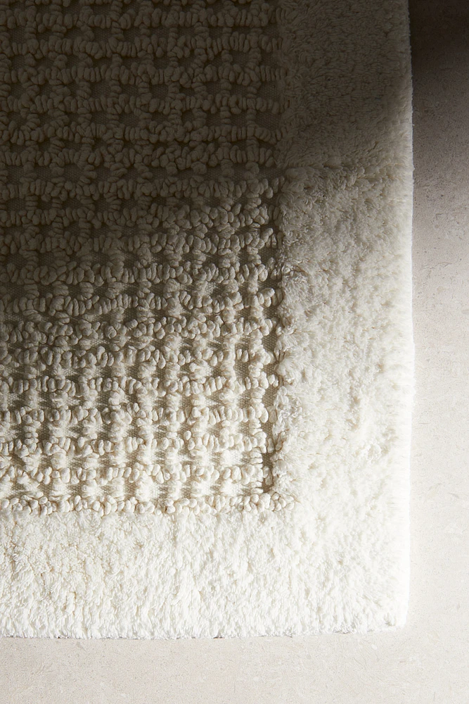 Tapis de bain en coton touffeté
