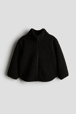 Veste coupe-vent en tissu peluche
