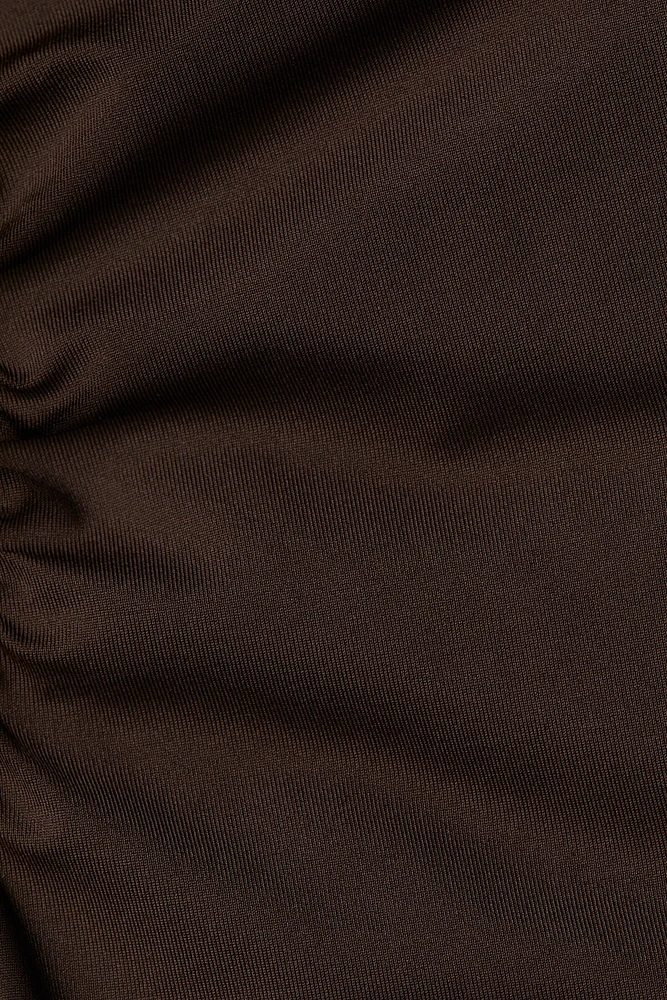 Robe combinaison à effet drapé