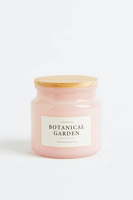 Bougie parfumée dans un pot en verre