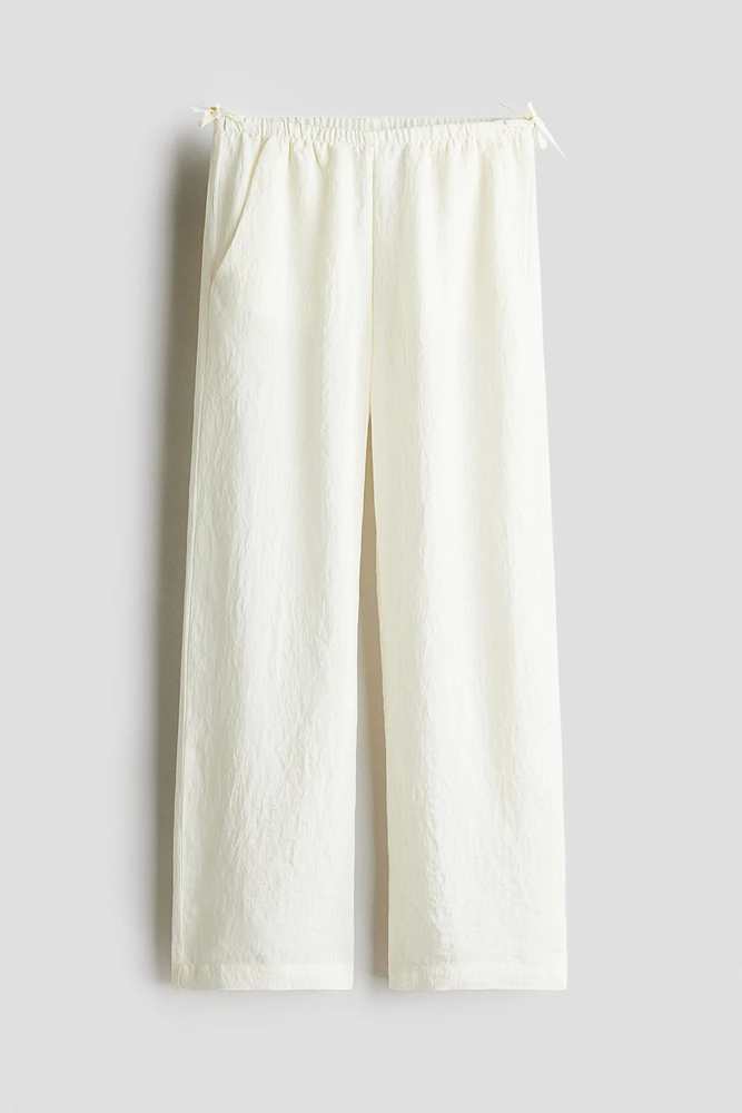 Pantalon avec détails à nouer