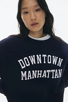 Sweatshirt with Text Motif