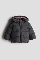 Manteau court matelassé avec appliqués