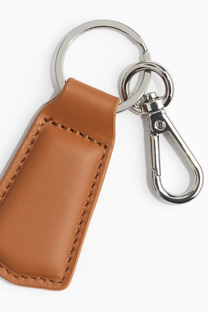 Porte-clés avec lanière en cuir