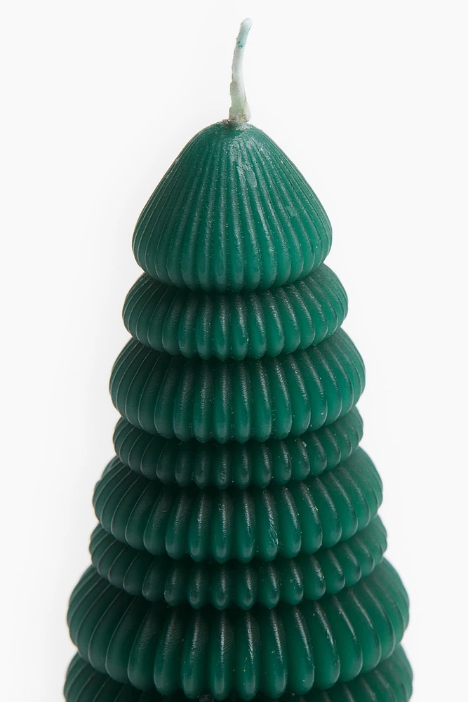 Small fir-tree-shaped candle