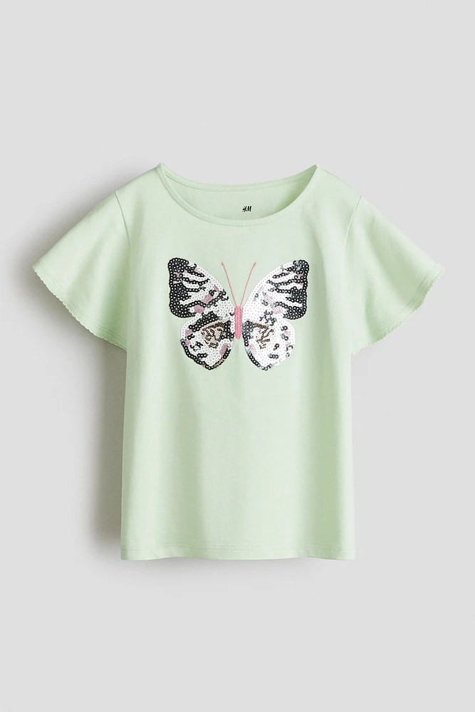 Haut avec motifs à sequins