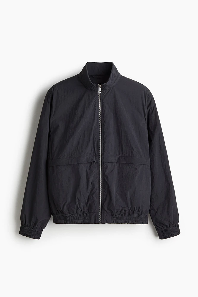 Veste coupe-vent flottante en nylon
