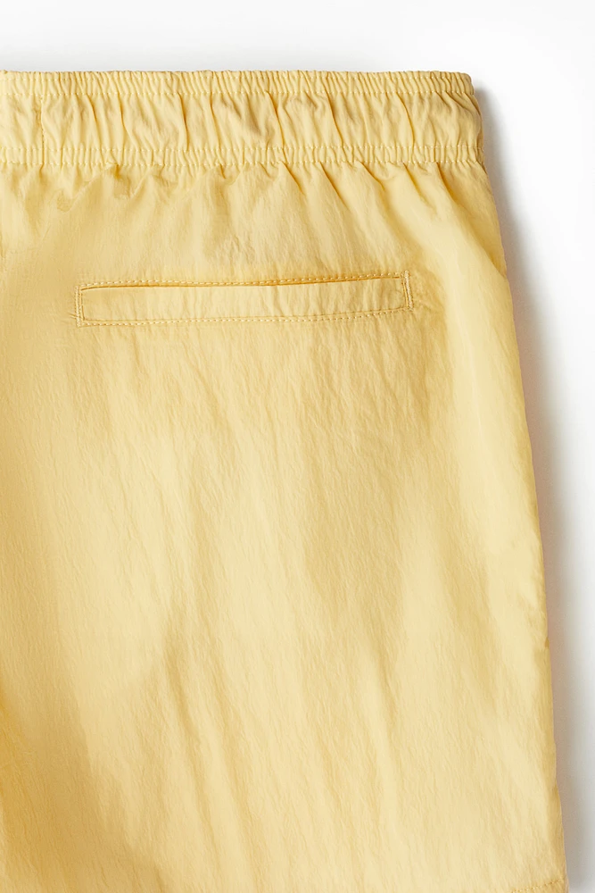 Short de bain froissé