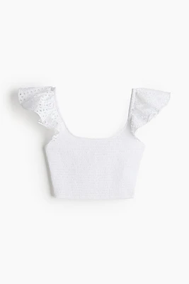 Haut court avec smocks