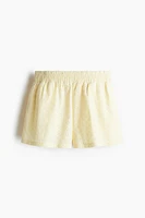 Short taille haute avec broderie anglaise
