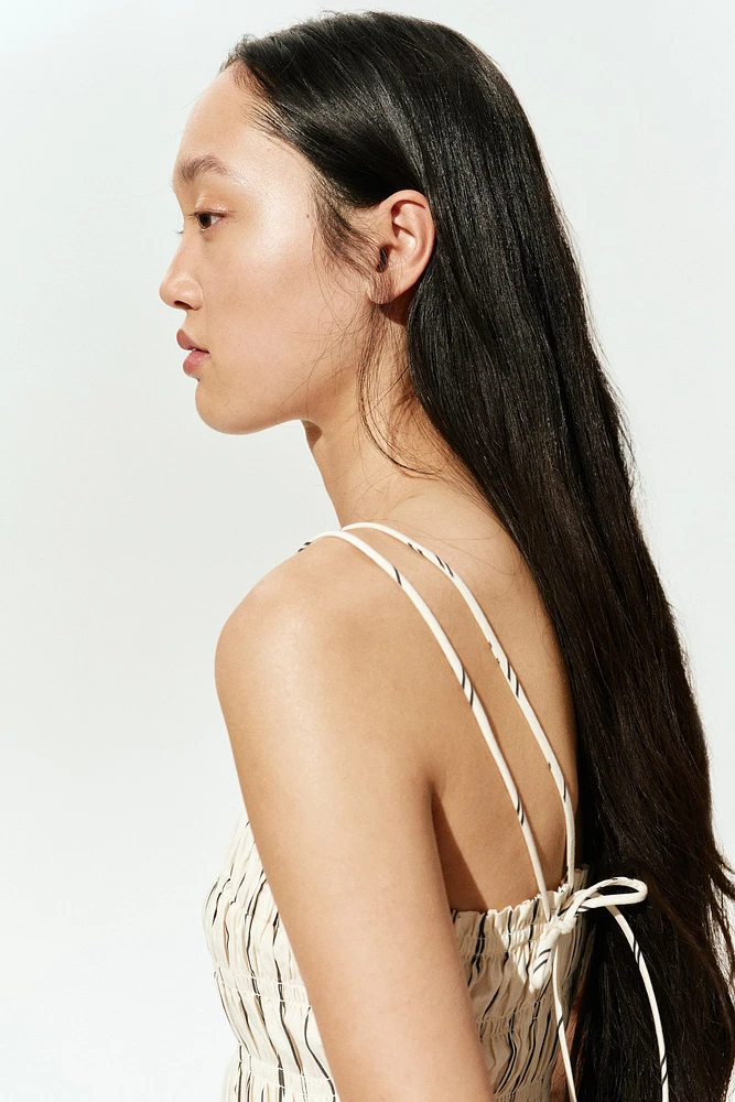 Robe en coton à corsage nid d'abeille