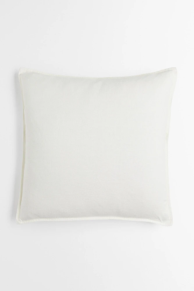 Housse de coussin en lin lavé