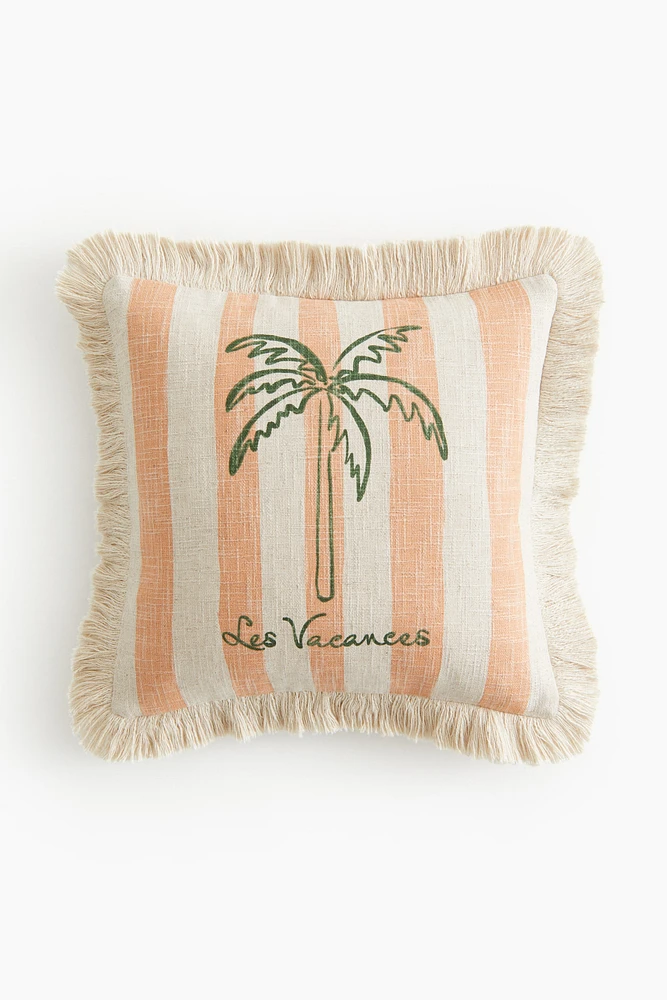 Housse de coussin frangée en lin mélangé