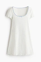 Overlocked-Trim Dress with Flared Skirt