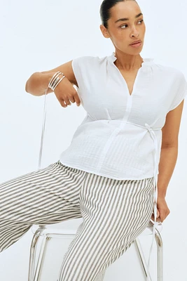 Blouse MAMA en mousseline avec ceinture à nouer