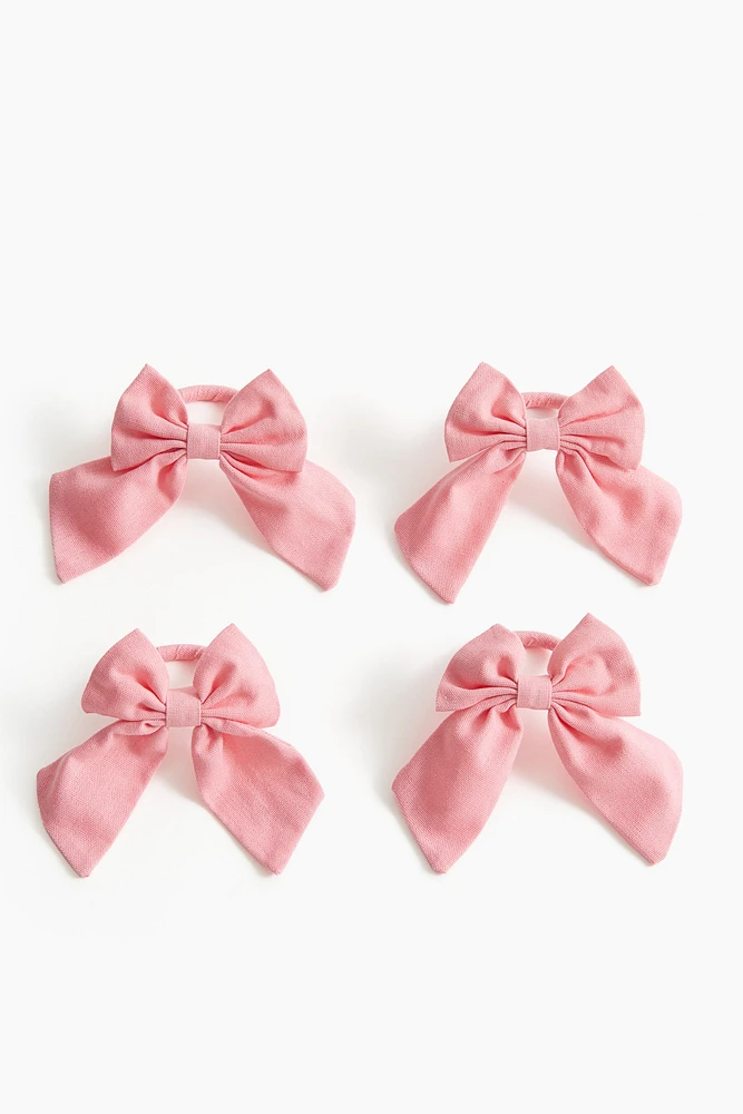 Lot de 4 ronds de serviette avec nœud