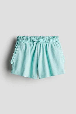 Short à taille froncée motif